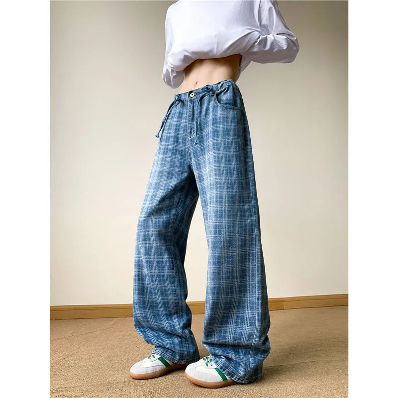 Retro blue plaid wide-leg skinny jeans showing straight-leg cut and zip fly