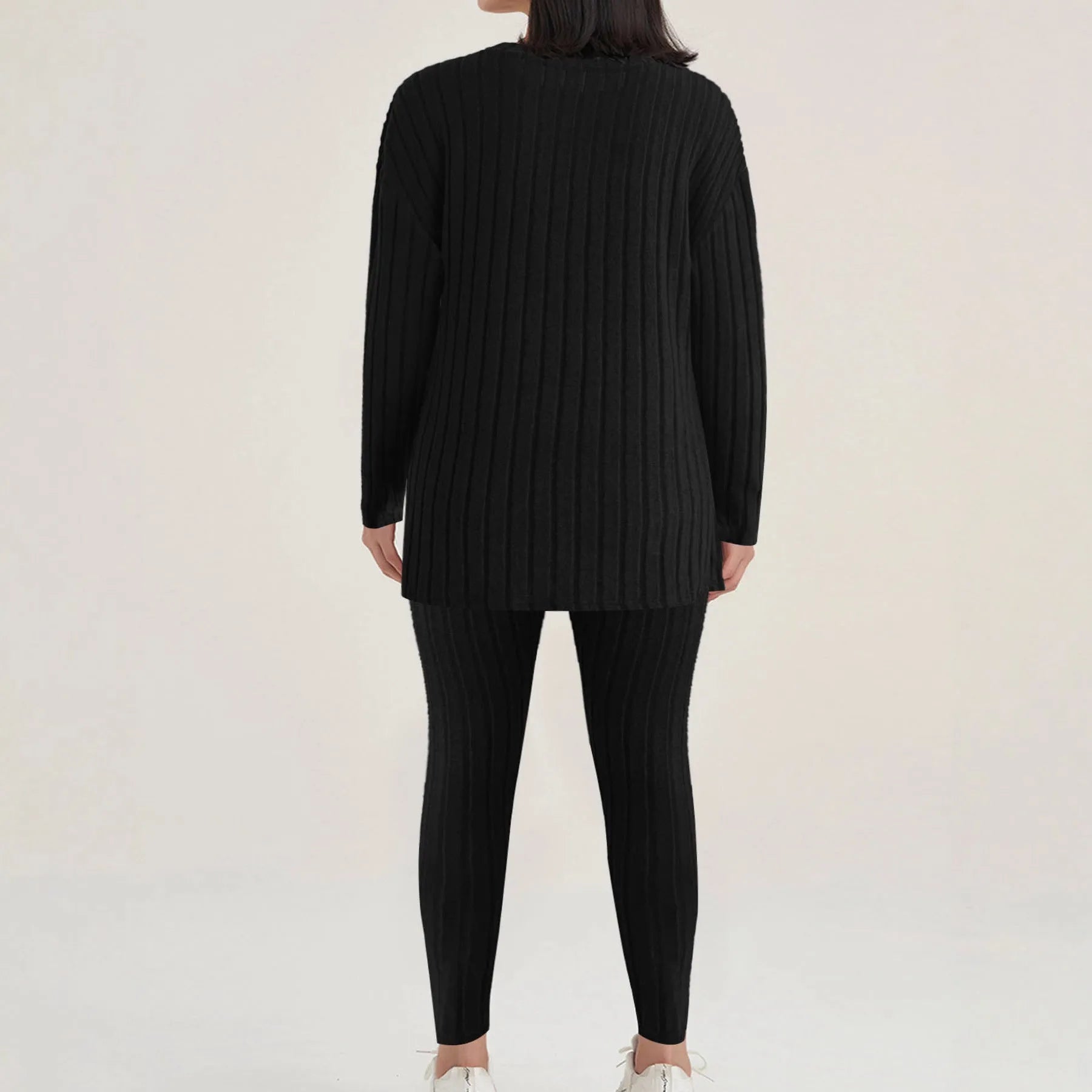 Sunken stripe black polyester two-piece homewear set showing trousers and top on Asian size mannequin