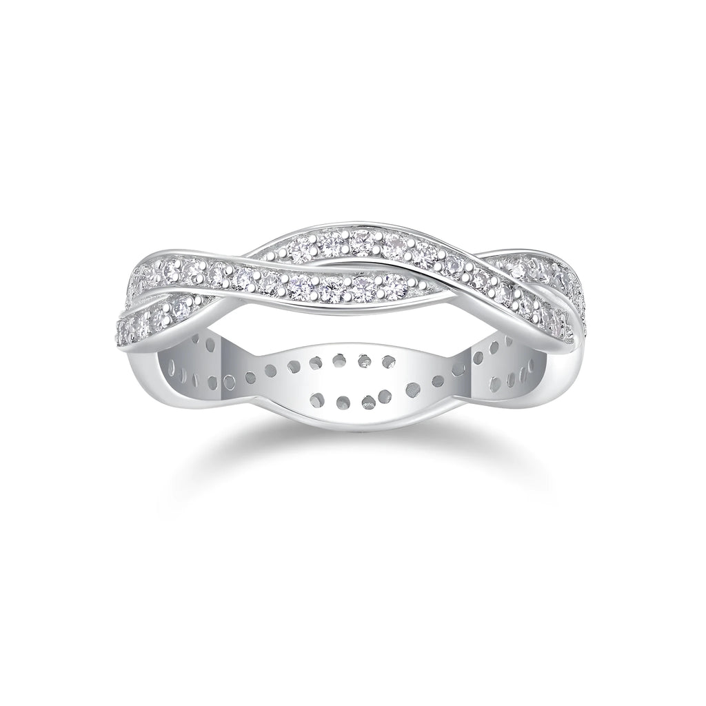 Moissanite wedding ring set in S925 silver with platinum plating on a white background