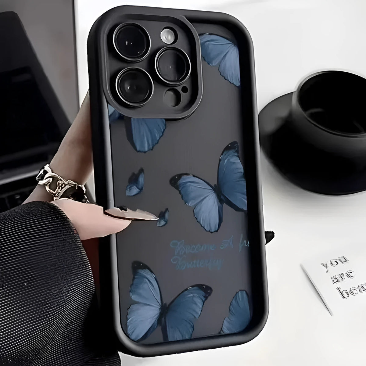 Blue butterfly printed edge drop-resistant TPU phone case for Apple iPhone in black