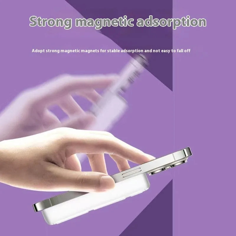 Folding bracket magnetic suction power bank 10000 MA in black plastic shell with phone attached showing stand mode