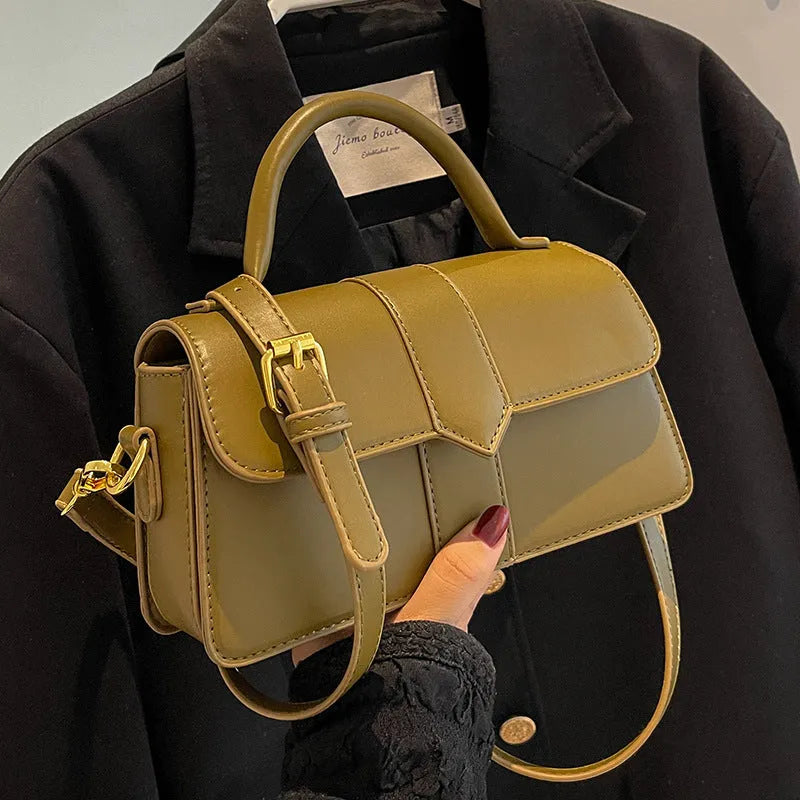 Women's PU leather messenger bag in horizontal square shape with sandwich pocket and file organisation