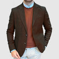 Men's loose-fit cotton suit jacket in army green colour, shown on a model.