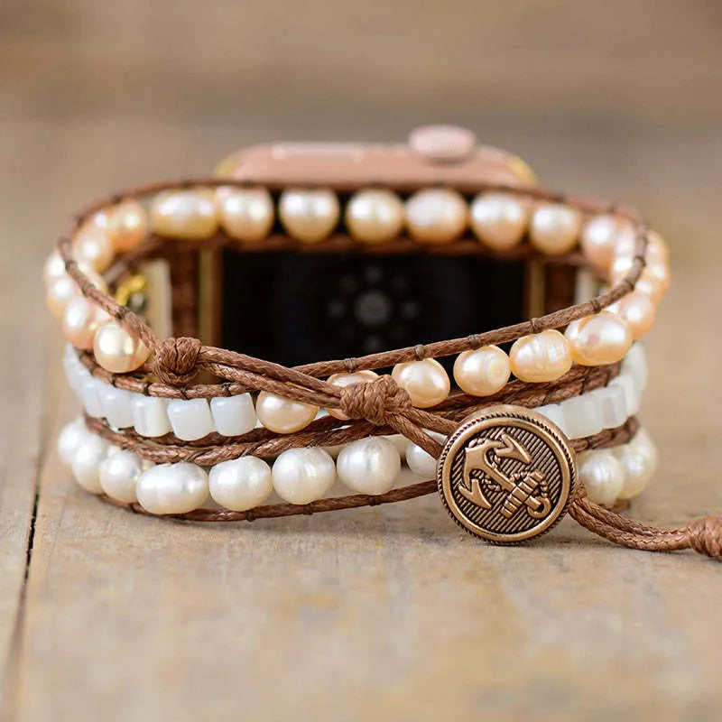 Handmade pearl watch strap on a wrist showing pearl accents, suitable for 38mm to 49mm dials