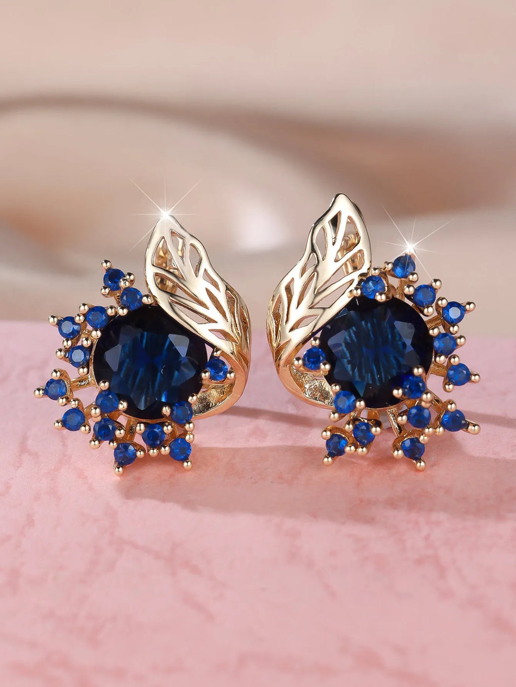 Round flower feather earrings with zircon stones in champagne gold finish, approximately 2-3cm diameter