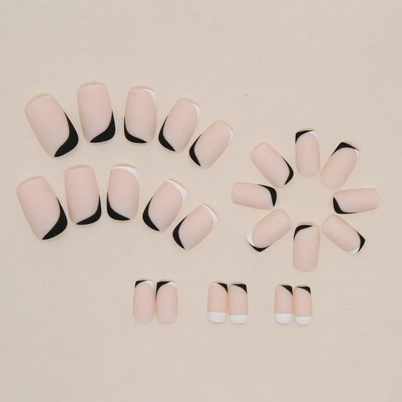 Black and white frosted false nails set with mandarin duck colour design
