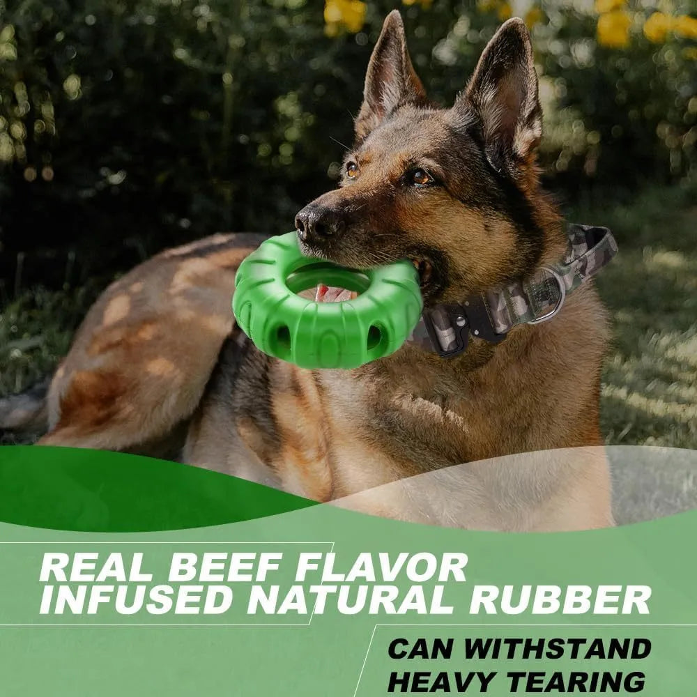 Blue rubber tyre-shaped dog chew toy with oval openings for slow feeding.