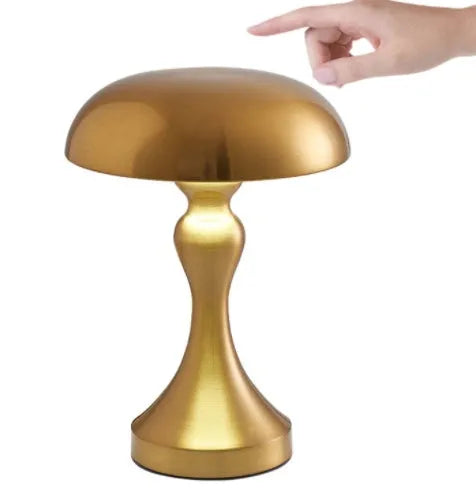Metallic USB rechargeable LED desk lamp with touch control in bronze, gold, or silver finish.