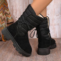 Black women's high-top suede snow boots with chunky rubber sole and lace-up design