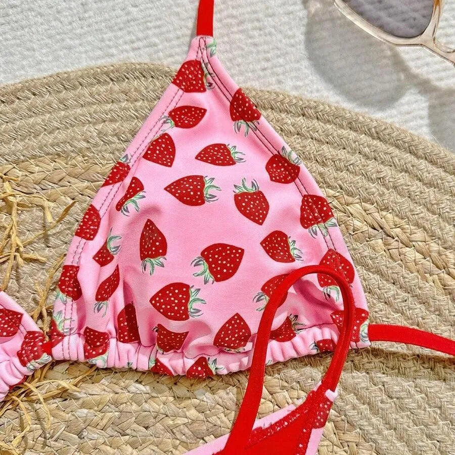 Women's pink strawberry print lace-up triangle bikini set with polyester-nylon fabric for swimming