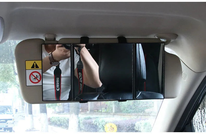 Silver car folding makeup mirror showing closed and open positions