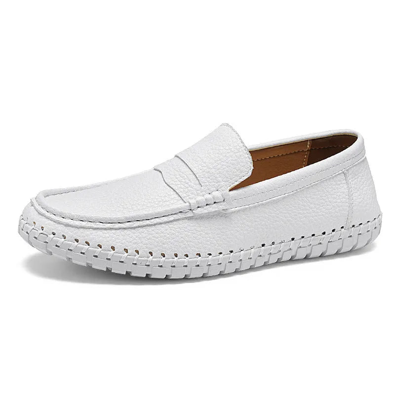 Men's casual leather slip-on shoes with hand-stitched bottom, square heel, and rubber sole in a neutral colour.