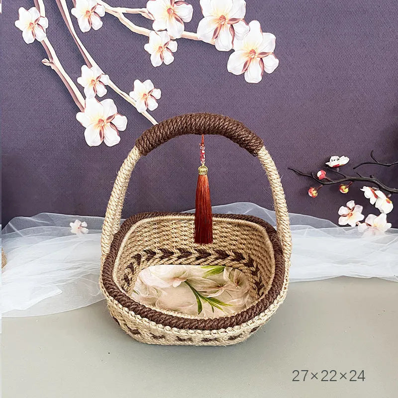 Hand-woven straw basket with hemp rope detailing in rustic coffee brown colour