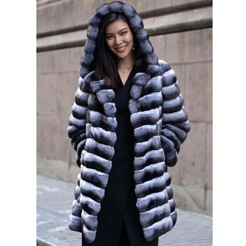 Women's zebra stripe pattern artificial mink faux fur mid-length coat on a hanger.