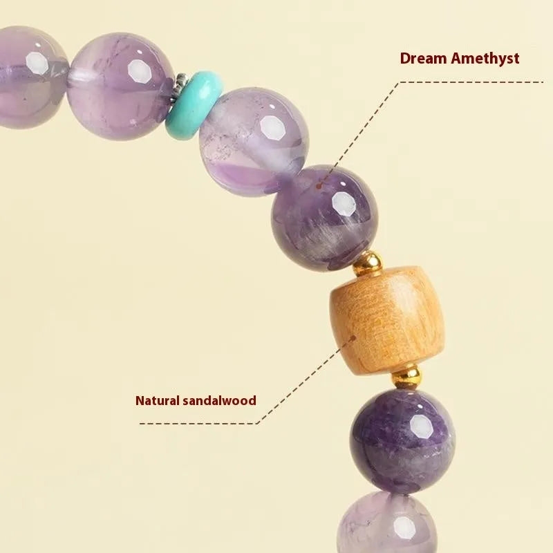 Purple amethyst crystal lucky bracelet for women on a white background.