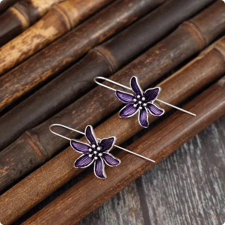 Purple flower-shaped alloy earrings with electroplated finish and butterfly back fastenings