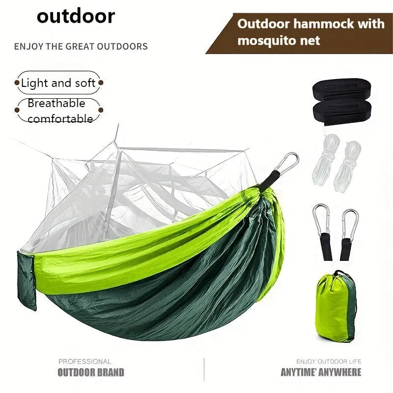 Portable double camping hammock with mosquito net and tree straps in outdoor setting