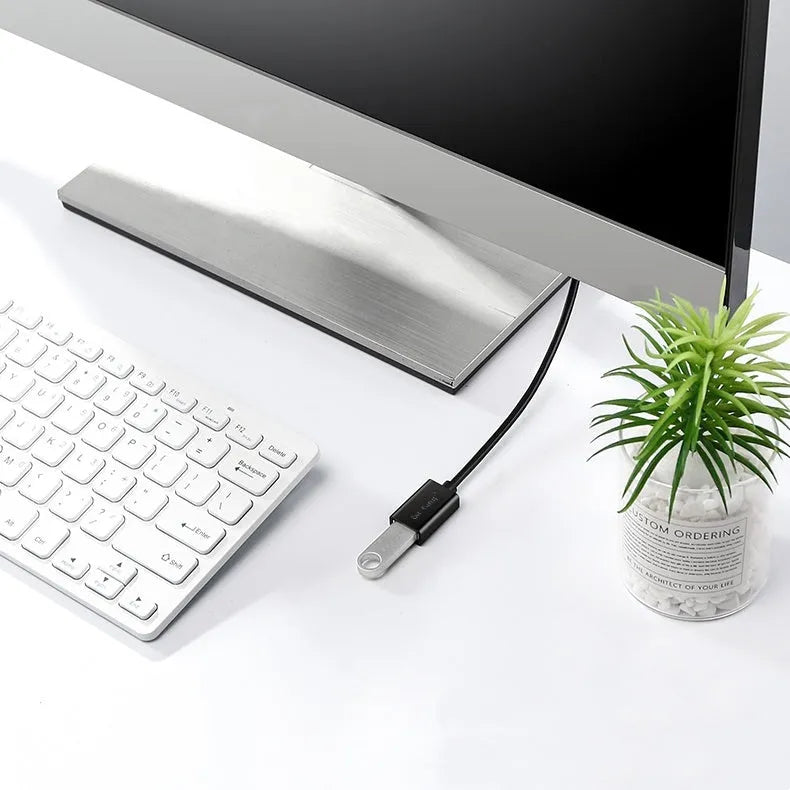 Black USB extension cable with male and female connectors, shown with length options from 1 to 5 metres.