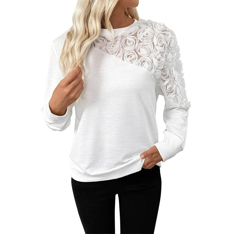 White women's long sleeve t-shirt with floral pattern, loose fit pullover style