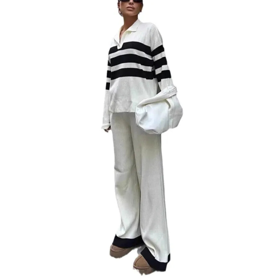 Women's black and white striped polo collar knit two-piece set with matching trousers