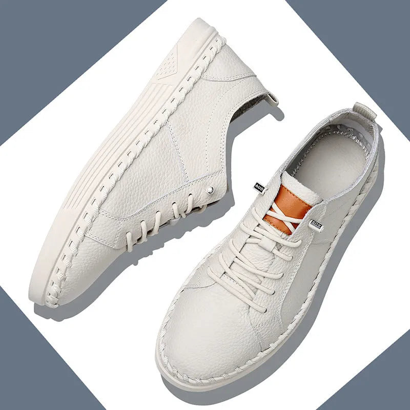 Men's beige cowhide leather casual sneakers with round toe and visible stitching.