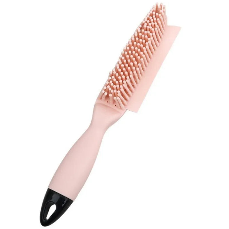 Green and pink dog brush with rubber bristles and pet hair remover function