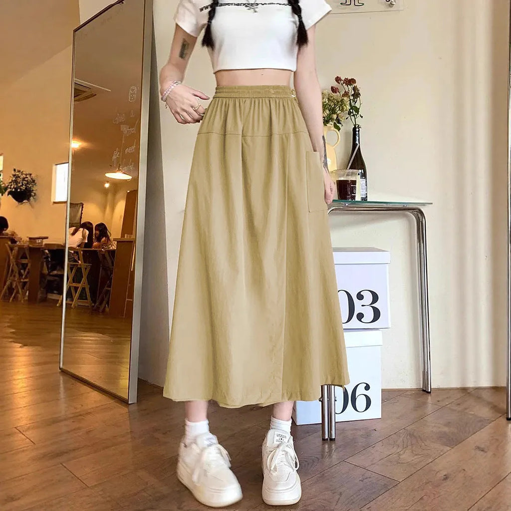Camel coloured women's wide leg skirt with elastic waist and drape detailing