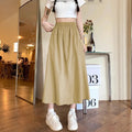Camel coloured women's wide leg skirt with elastic waist and drape detailing