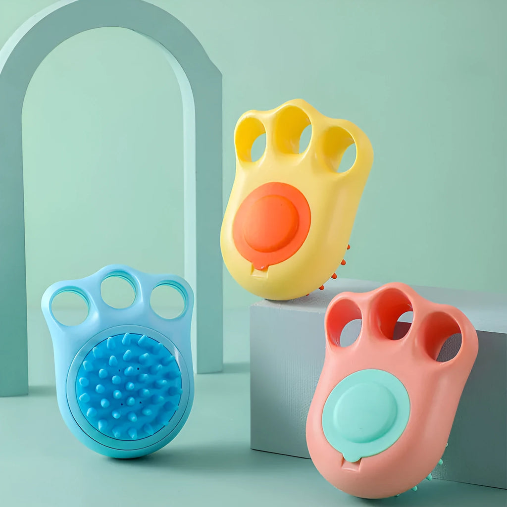 Silicone pet bath brush for cats and dogs measuring 12cm with soft bristles