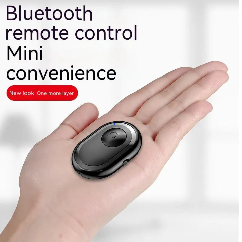 Compact black Bluetooth remote control for smartphone camera triggering