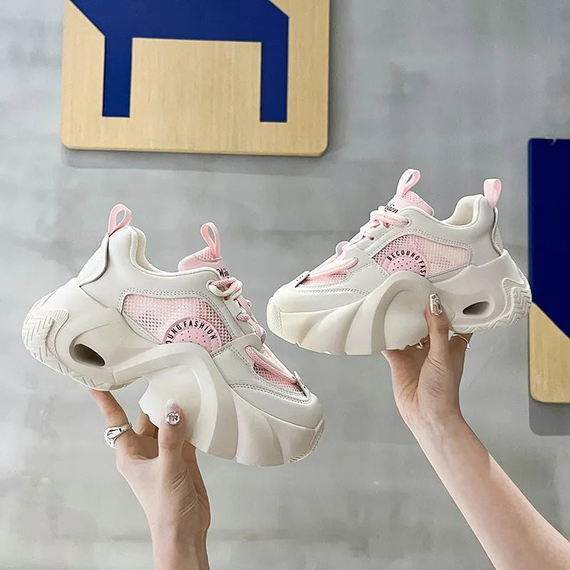 Women's pink casual sneakers with cross straps and thick platform sole