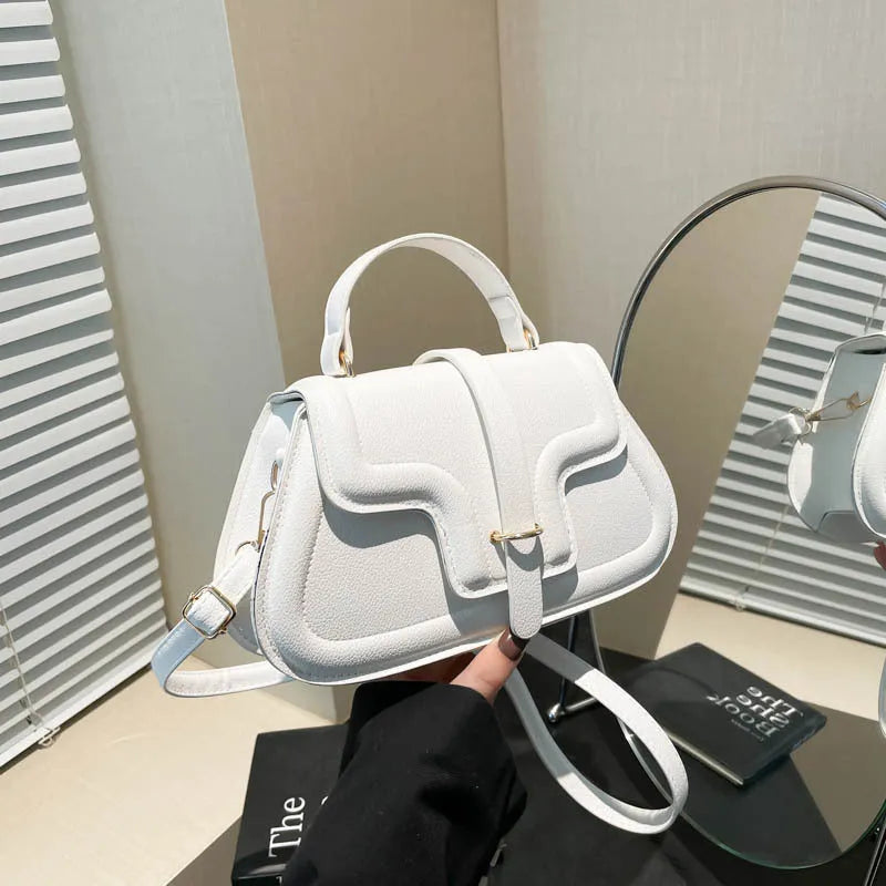 Simple PU shoulder bag in black, white or red with single strap and horizontal square shape.