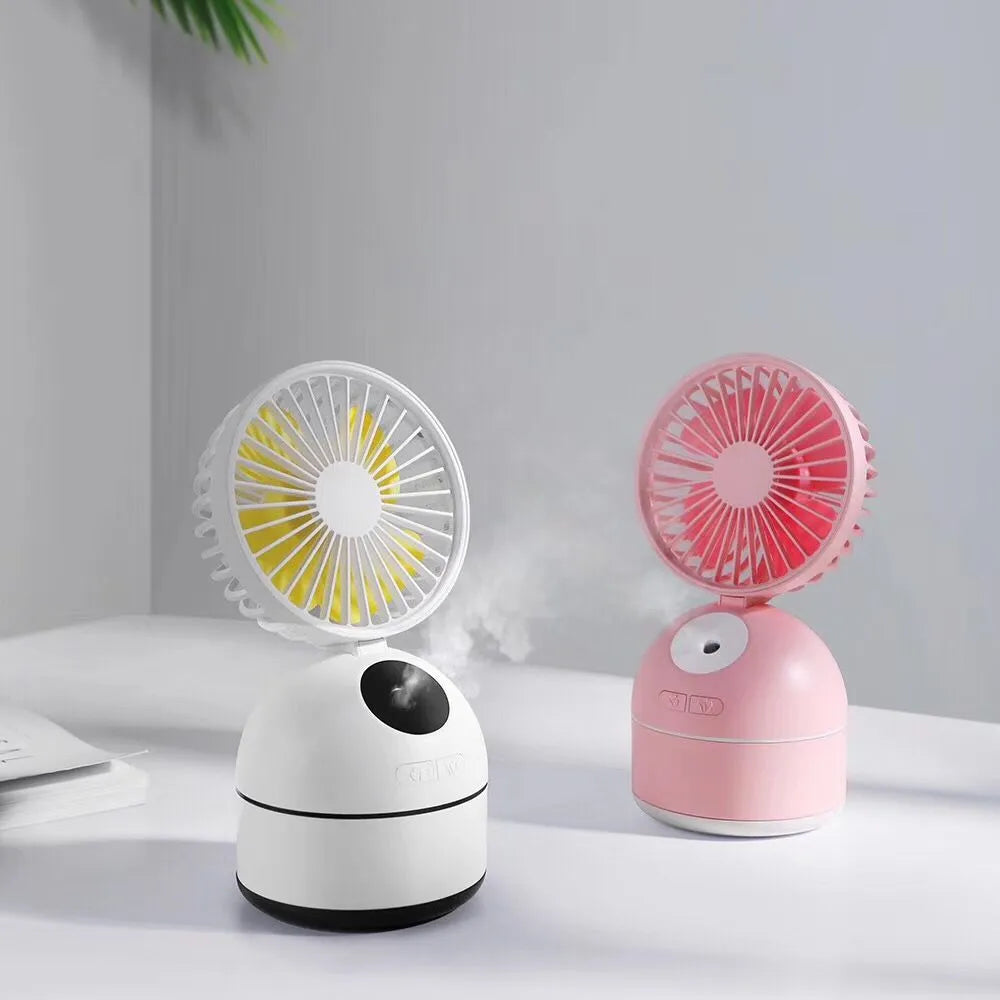Mini USB fan humidifier in white, side view showing fan blades and mist nozzle