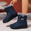 Women's snow boots in black with buckle fastening and round toe