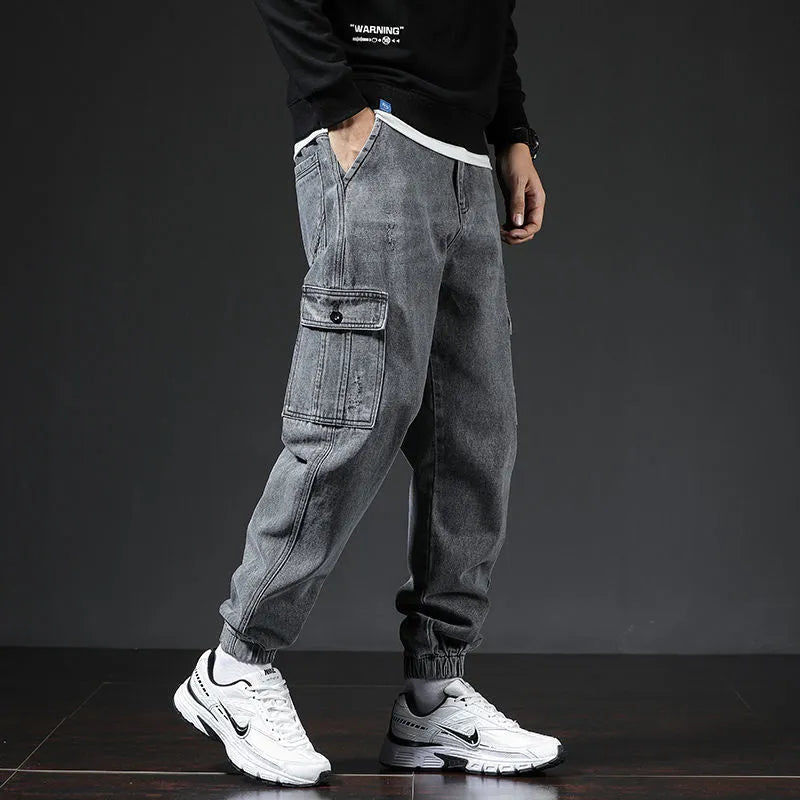 Japanese-style multi-pocket cotton workwear jeans for men in blue, black, and gray, sizes M to 5XL