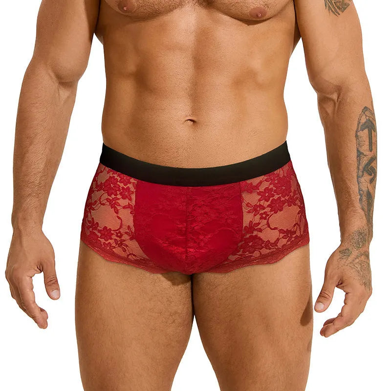 Men's black lace briefs with hollow out see-through design showing nylon fabric construction