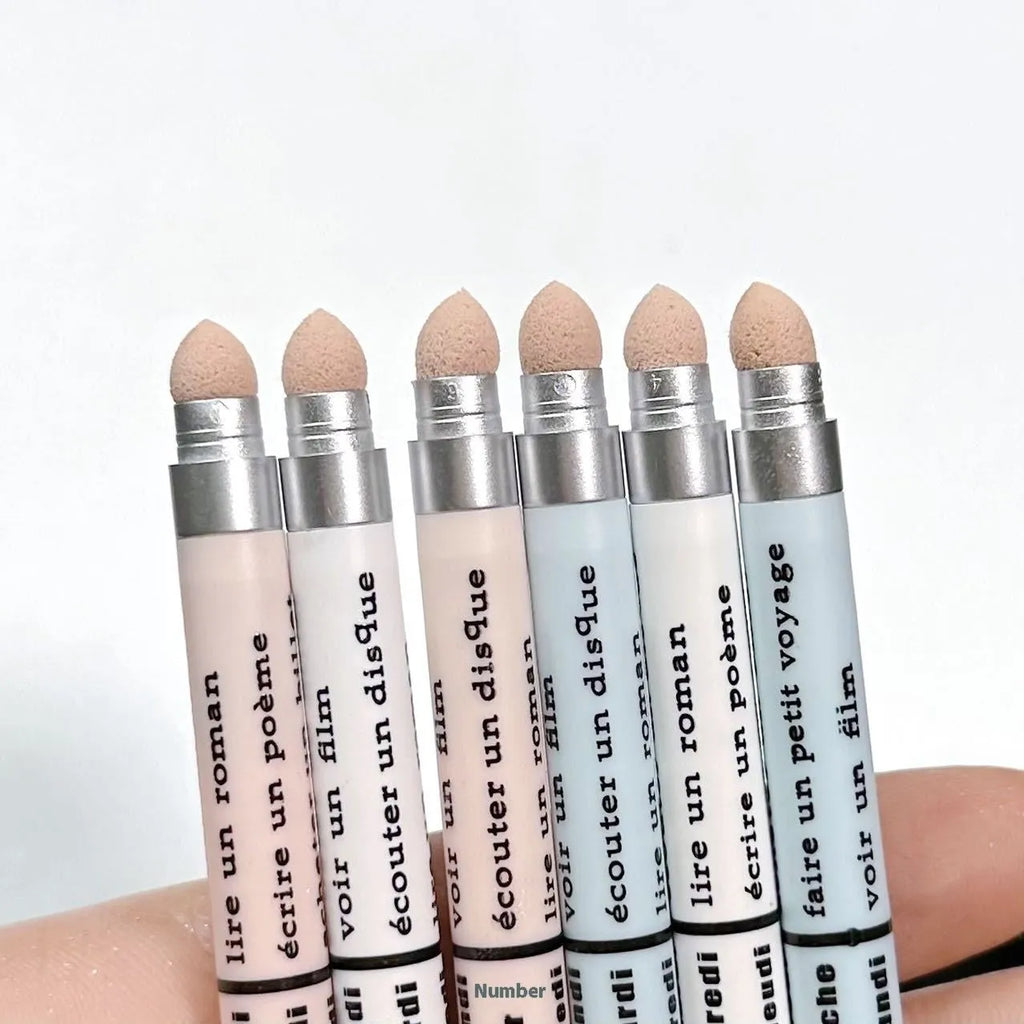 Waterproof and sweat-proof 2-in-1 eyeliner pen showing range of 15 colour shades including gold, purple, silver and brown