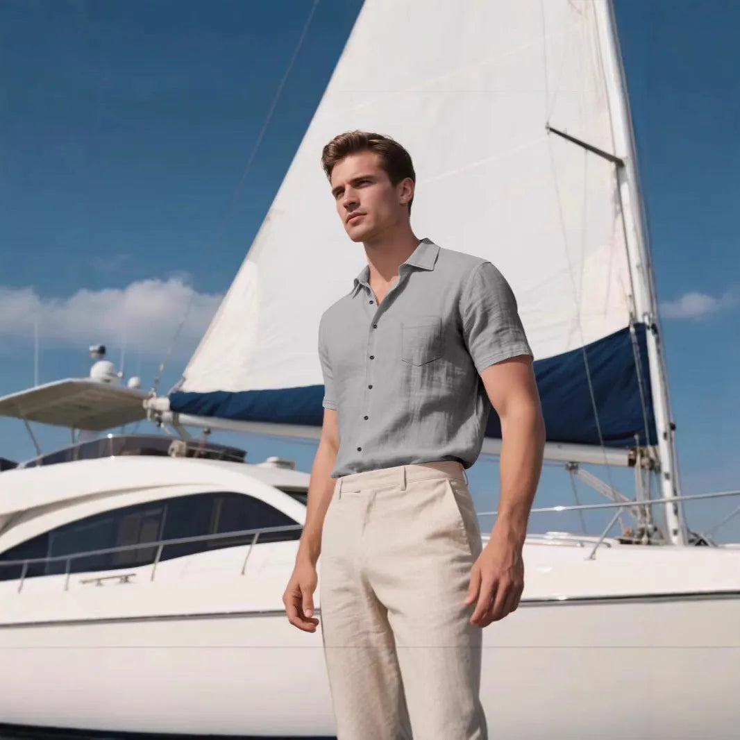 Men's loose fit short sleeve linen shirt in a solid colour, showing cardigan style and casual design.
