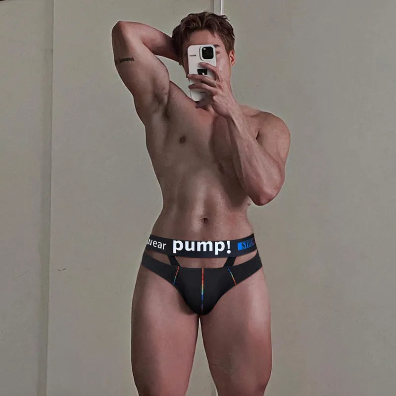 Men's solid black modal low-waist briefs laid flat
