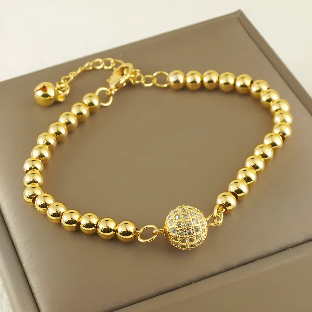 Arabic style women's copper bracelet with heart-shaped pendant featuring single zircon stone