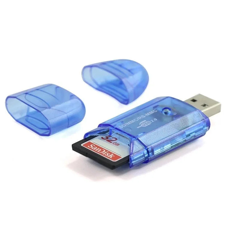 Transparent plastic USB card reader with optional LED light on a desk.