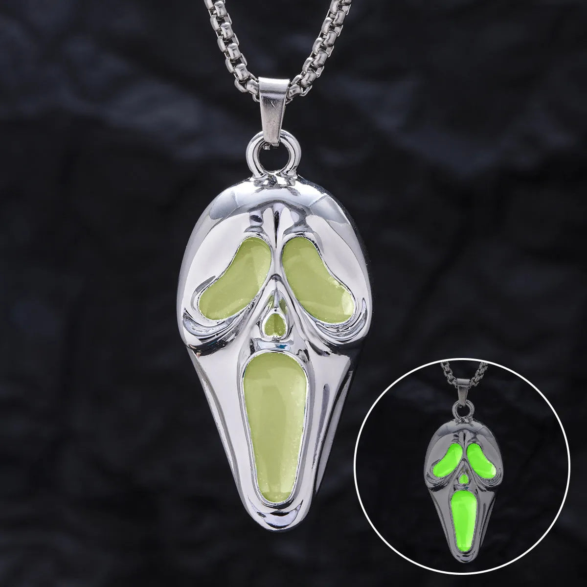 Exaggerated skull luminous mask pendant necklace on square pearl chain, available in luminous blue, luminous green, and hollow out colours