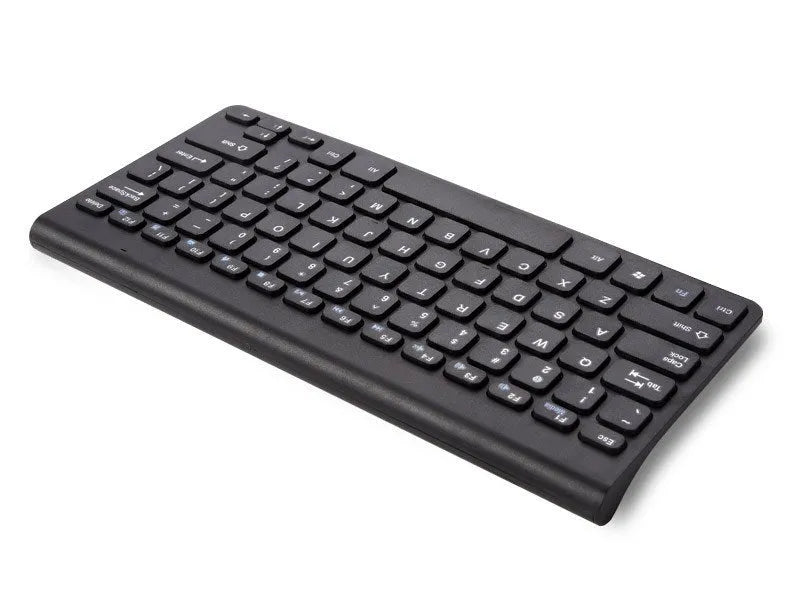 Black and white wireless keyboard and mouse set on a desk.