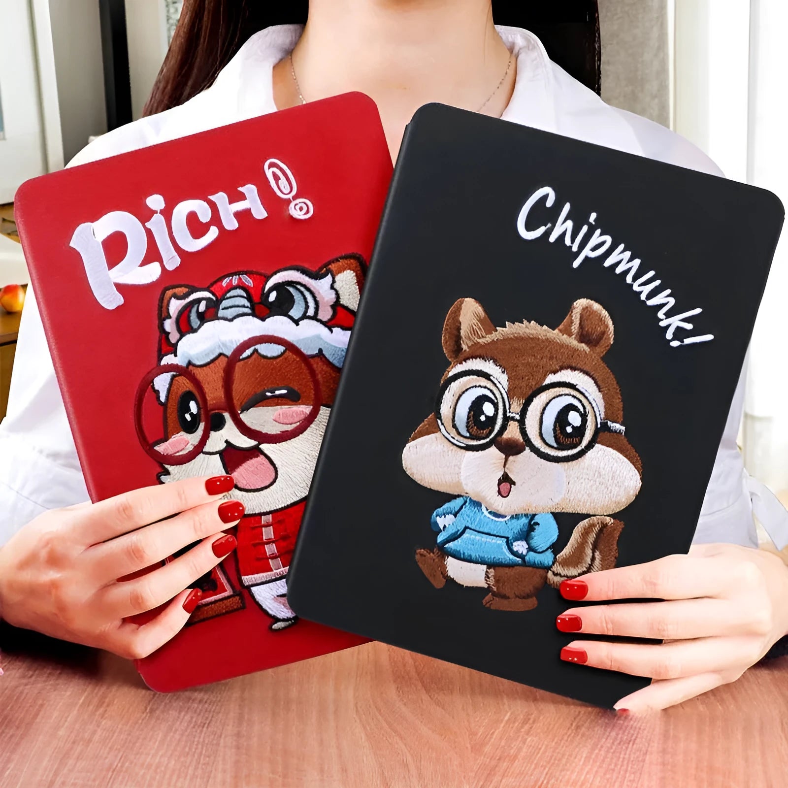 Cartoon design silicone protective sleeve for iPad with imitation leather finish and included screen protector.