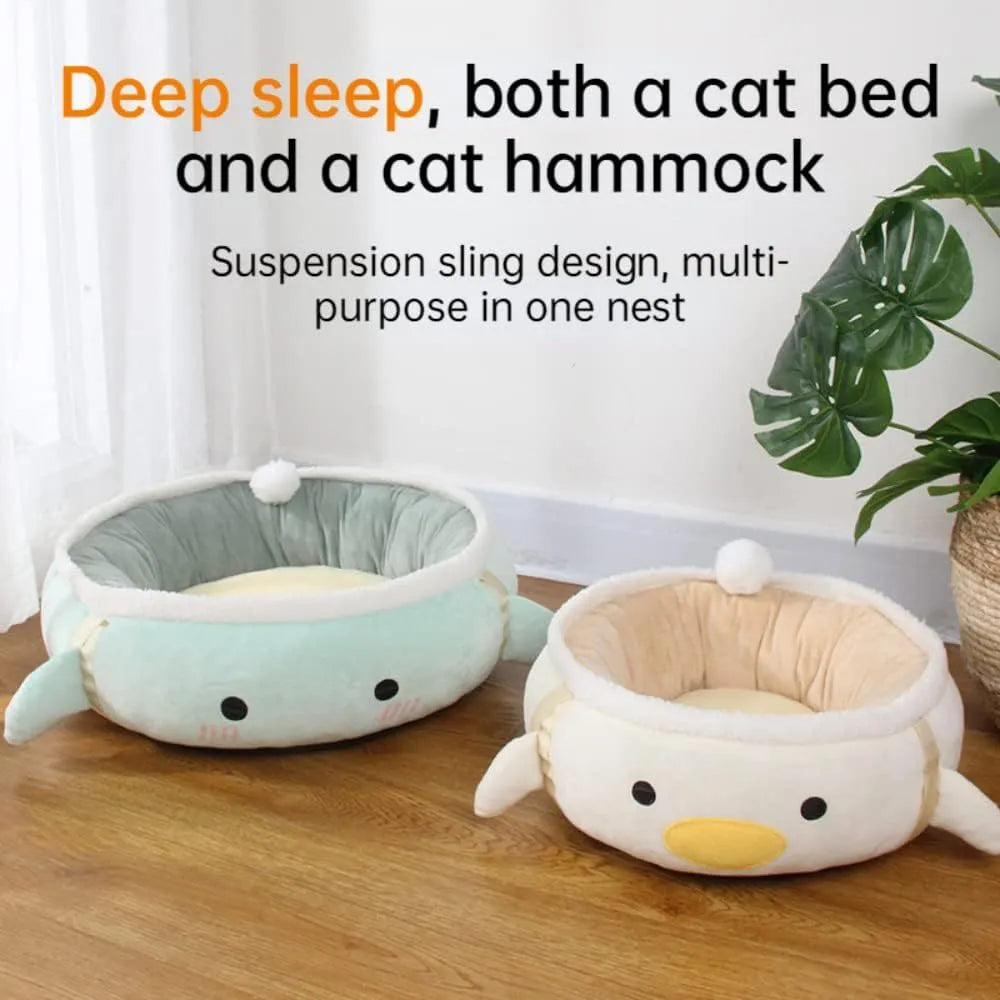 Green dinosaur-shaped cat bed with a chick inside, shown both flat and hanging as a hammock.