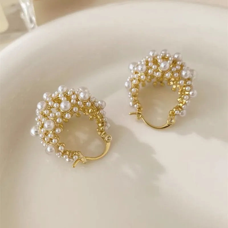Gold-colour copper flower basket earrings with small beads and pearl inlay decoration