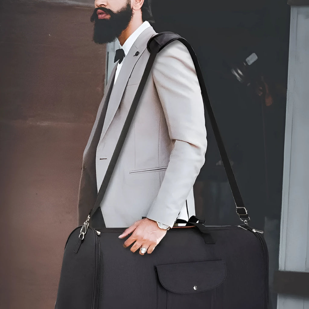 Dark blue Oxford cloth duffel bag with side handle and adjustable shoulder strap.