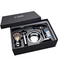 CSB men's shaving set with chrome stand holding a double-edge razor and badger hair brush, plus soap bowl and blades.
