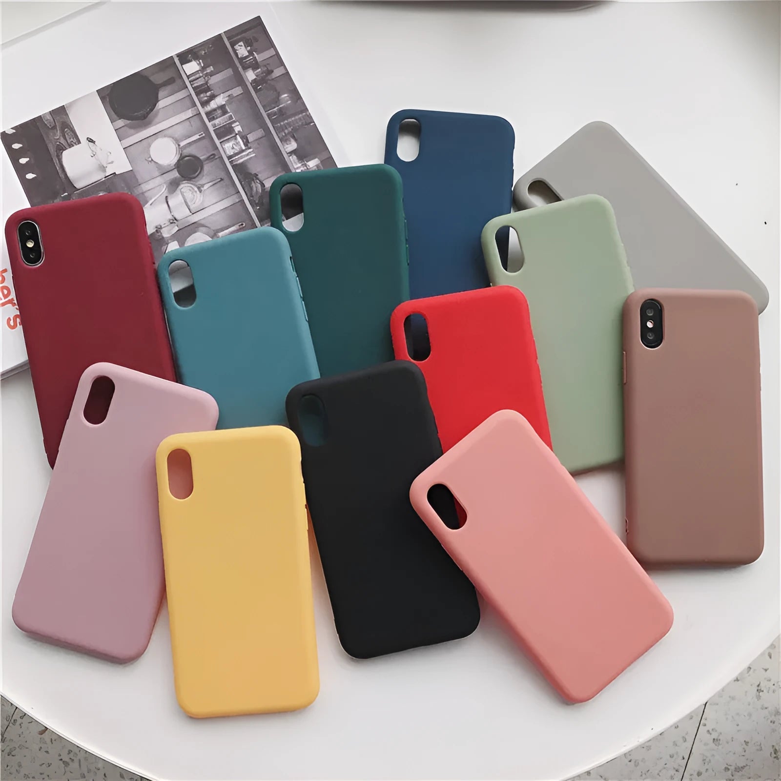 Silicone phone case for iPhone XR and XS Max shown in various colours including wine red and rose gold
