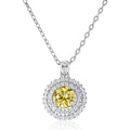 Sterling silver necklace with 1 karat golden yellow inlaid gem pendant